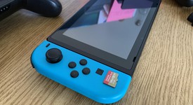 Mint
													Nintendo Switch - Red & Blue, 32 GB, photo 2 of 9