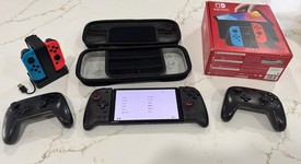 Good
													Nintendo Switch - OLED - Red & Blue, 64 GB, photo 1 of 11