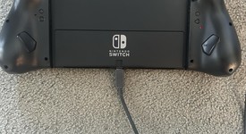 Good
													Nintendo Switch - OLED - Black, 64 GB, Super Smash Bros., photo 3 of 5