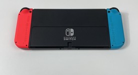 Fair
													Nintendo Switch - OLED - Red & Blue, 64 GB, photo 4 of 8