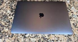 Good
													MacBook Pro 2018 (With Touch Bar) - 15" - I9, Silver, 1 TB, 32 GB, photo 1 of 6