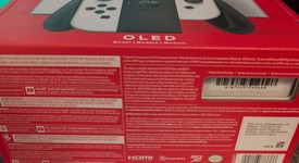 New
													Nintendo Switch - OLED - White, 64 GB, photo 2 of 7