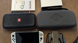 Mint
													Nintendo Switch - OLED - White, 64 GB, photo 1 of 7