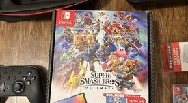 Good
													Nintendo Switch - OLED - Black, 64 GB, Super Smash Bros., photo 3 of 10