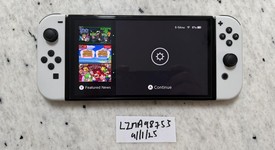 Mint
													Nintendo Switch - OLED - White, 64 GB, photo 3 of 15