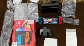 Mint
													Nintendo Switch - OLED - Red & Blue, 64 GB, photo 1 of 2