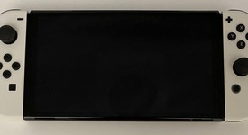 Mint
													Nintendo Switch - OLED - White, 64 GB, photo 2 of 6