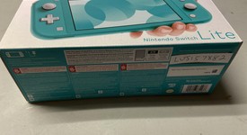 New
													Nintendo Switch Lite - Turquoise, photo 3 of 3