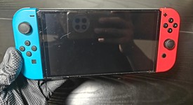 Good
													Nintendo Switch - OLED - Red & Blue, 64 GB, photo 3 of 7