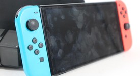 Good
													Nintendo Switch - OLED - Red & Blue, 64 GB, photo 3 of 4