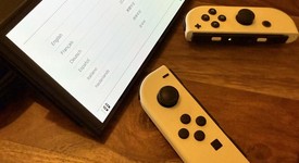 Mint
													Nintendo Switch - OLED - White, 64 GB, photo 3 of 10