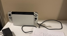 Good
													Nintendo Switch - OLED - White, 64 GB, photo 1 of 8
