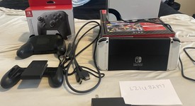 Mint
													Nintendo Switch - OLED - White, 64 GB, photo 4 of 4