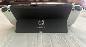 Mint
													Nintendo Switch - OLED - White, 64 GB, photo 4 of 10