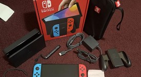 Mint
													Nintendo Switch - OLED - Red & Blue, 64 GB, photo 1 of 8