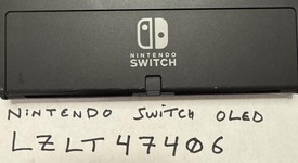 Good
													Nintendo Switch - OLED - Black, 64 GB, Super Smash Bros., photo 5 of 8