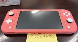 Mint
													Nintendo Switch Lite - Coral, photo 3 of 9