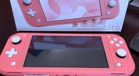 Mint
													Nintendo Switch Lite - Coral, photo 1 of 9