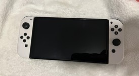 Mint
													Nintendo Switch - OLED - White, 64 GB, photo 5 of 13