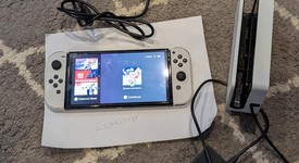 Mint
													Nintendo Switch - OLED - White, 64 GB, photo 5 of 12