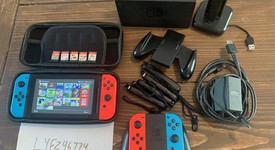 Good
													Nintendo Switch - Red & Blue, 32 GB, photo 1 of 3