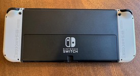 Mint
													Nintendo Switch - OLED - White, 64 GB, photo 4 of 6