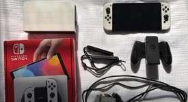 Mint
													Nintendo Switch - OLED - White, 64 GB, photo 2 of 12
