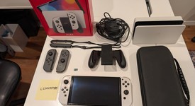 Good
													Nintendo Switch - OLED - White, 64 GB, photo 1 of 9