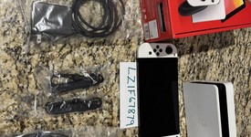 Mint
													Nintendo Switch - OLED - White, 64 GB, photo 3 of 11