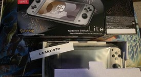 New
													Nintendo Switch Lite - Gray, Dialga & Palkia Edition, photo 2 of 6