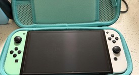 Good
													Nintendo Switch - OLED - White, 64 GB, photo 1 of 10