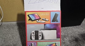 New
													Nintendo Switch - OLED - White, 64 GB, photo 2 of 4