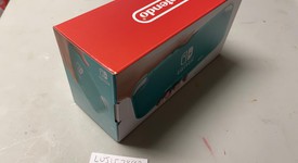 New
													Nintendo Switch Lite - Turquoise, photo 2 of 3