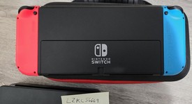 Good
													Nintendo Switch - OLED - Black, 64 GB, Super Smash Bros., photo 3 of 11