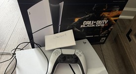 Good
													PlayStation 5 Slim Digital Edition (2023) - Gray, 1 TB, 30th Anniversary, photo 1 of 4