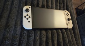 Mint
													Nintendo Switch - OLED - White, 64 GB, photo 2 of 7