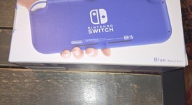 New
													Nintendo Switch Lite - Blue, photo 1 of 5