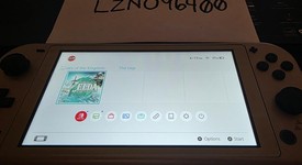 Mint
													Nintendo Switch Lite - Gold, Hyrule Edition, photo 2 of 11