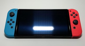 Good
													Nintendo Switch - OLED - Red & Blue, 64 GB, photo 4 of 9