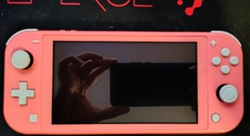 Good
													Nintendo Switch Lite - Coral, photo 1 of 11