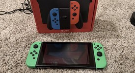 Good
													Nintendo Switch - OLED - Red & Blue, 64 GB, photo 4 of 10