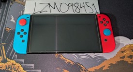 Good
													Nintendo Switch - OLED - Red & Blue, 64 GB, photo 1 of 8