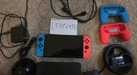 Good
													Nintendo Switch - OLED - Red & Blue, 64 GB, photo 2 of 9