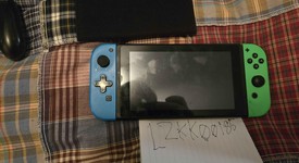 Good
													Nintendo Switch - Grey, 32 GB, Super Smash Bros. Edition, photo 1 of 9