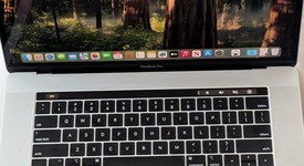 Good
													MacBook Pro 2018 (With Touch Bar) - 15" - I7, Silver, 256 GB, 16 GB, photo 1 of 9