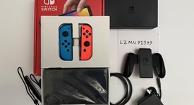 Mint
													Nintendo Switch - OLED - Red & Blue, 64 GB, photo 1 of 10