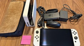 Good
													Nintendo Switch - OLED - White, 64 GB, photo 1 of 11