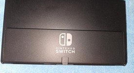Mint
													Nintendo Switch - OLED - White, 64 GB, photo 4 of 13