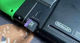 Good
													Nintendo Switch - Pink & Green, 32 GB, photo 5 of 6