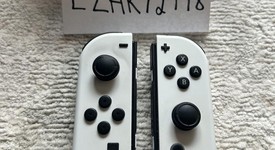 Mint
													Nintendo Switch - OLED - White, 64 GB, photo 2 of 7
